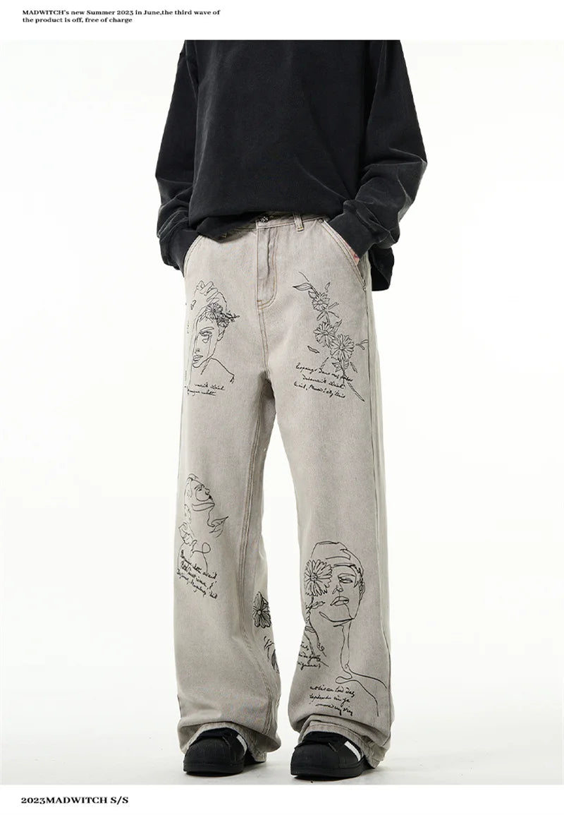 جينز مطبوع عليه رسومات جرافيتي أمريكية عتيقة