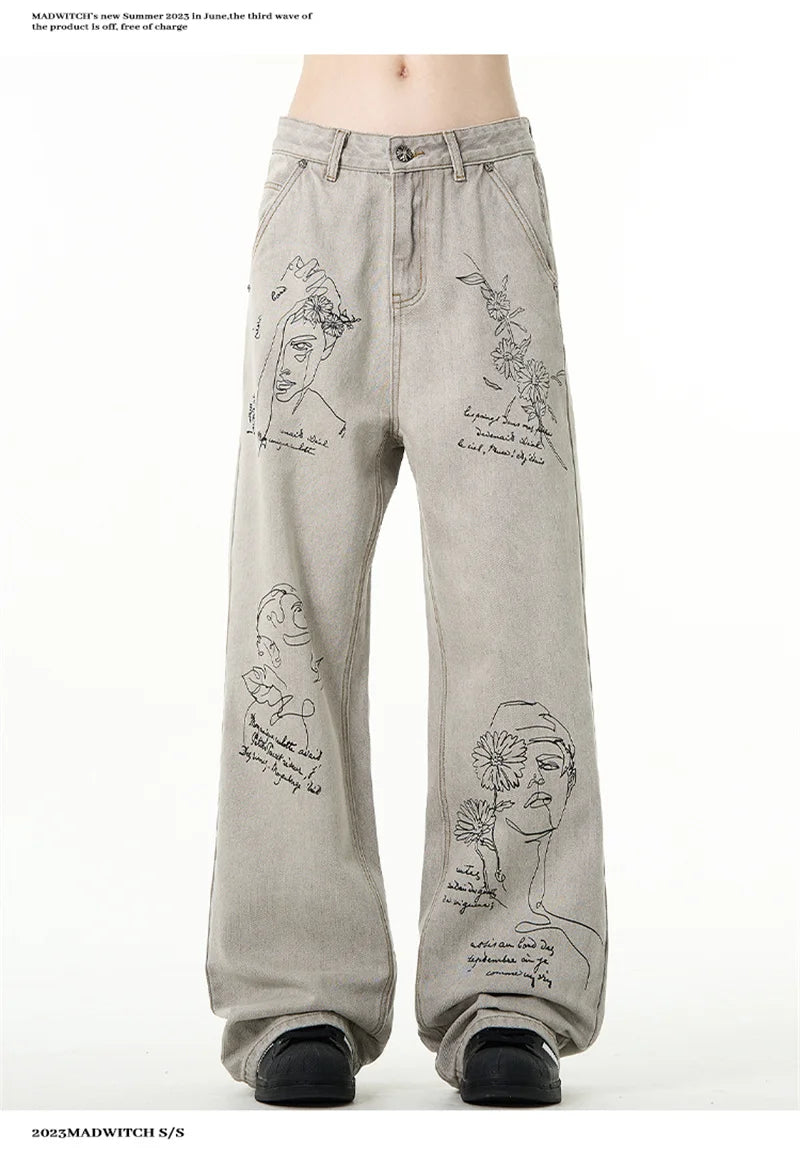 جينز مطبوع عليه رسومات جرافيتي أمريكية عتيقة