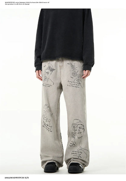 جينز مطبوع عليه رسومات جرافيتي أمريكية عتيقة