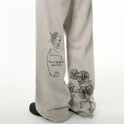 جينز مطبوع عليه رسومات جرافيتي أمريكية عتيقة