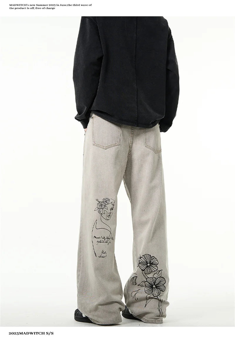 جينز مطبوع عليه رسومات جرافيتي أمريكية عتيقة